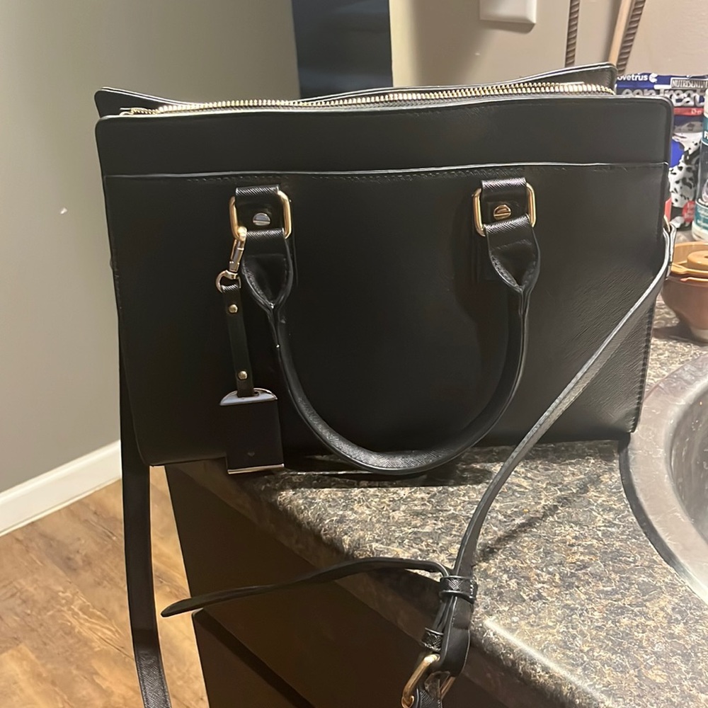 Miztique like-new black bag. With adjustable strap for cross-body & shoulder.